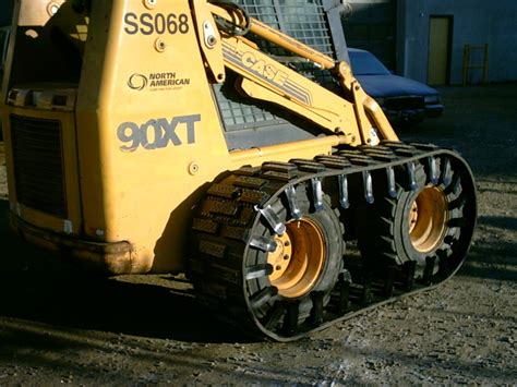 rubber tracks for skid steer over tire|bobcat 753 over tire tracks.